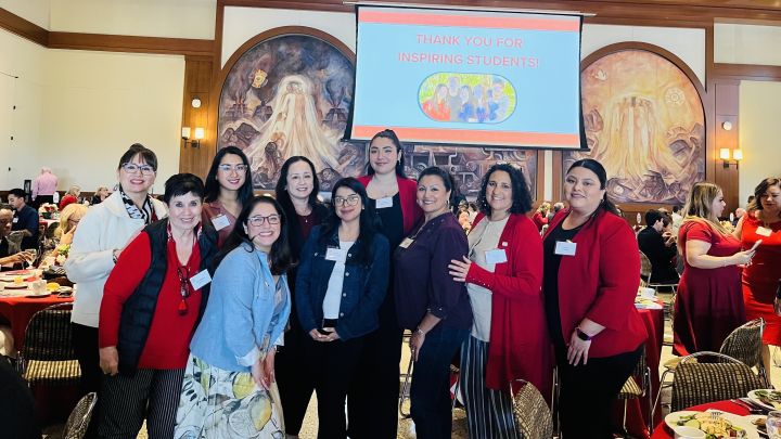 Dalia Martinez and Cohort at Conference Table 